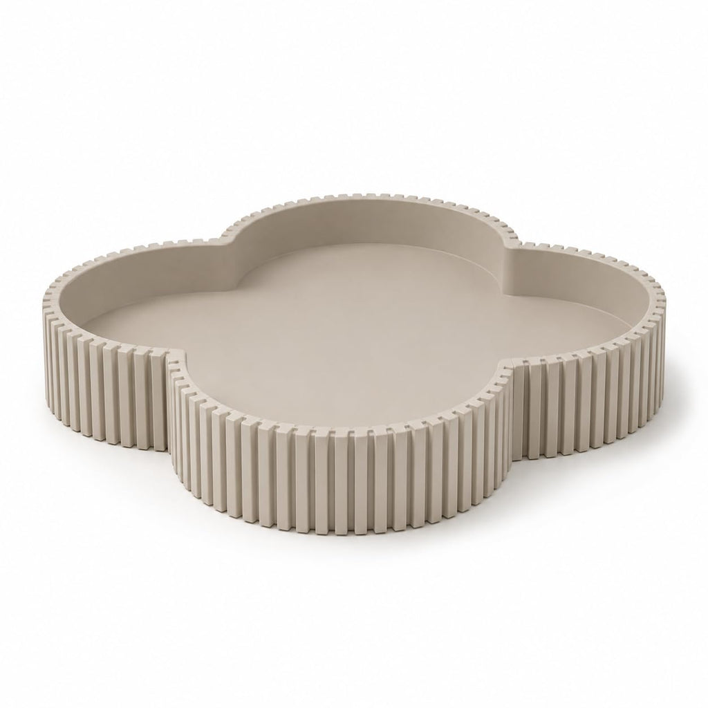 Beige clover ribbed decorative tray, front view on white background