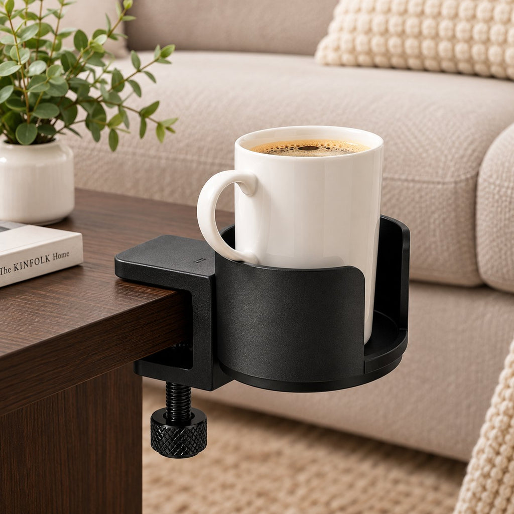 Black clamp cup holder on coffee table holding coffee mug