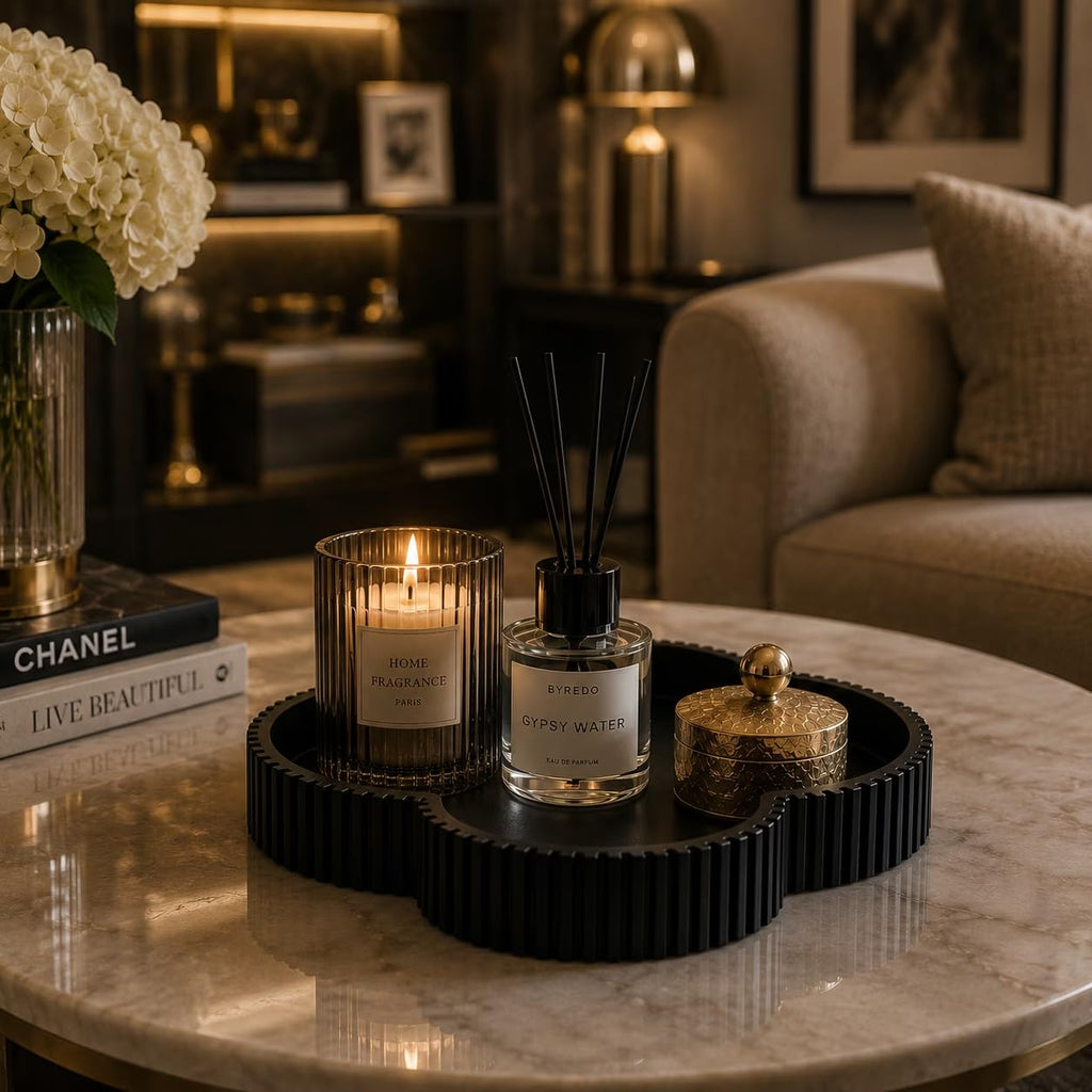 Black clover tray on coffee table with candle and diffuser