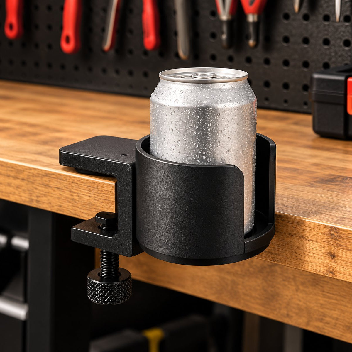 Black desk cup holder on workbench holding soda can
