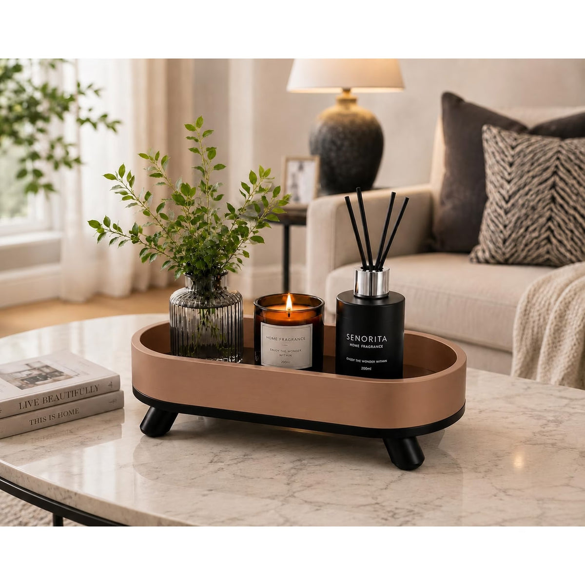 Down to earth oval tray on coffee table with vase and candle