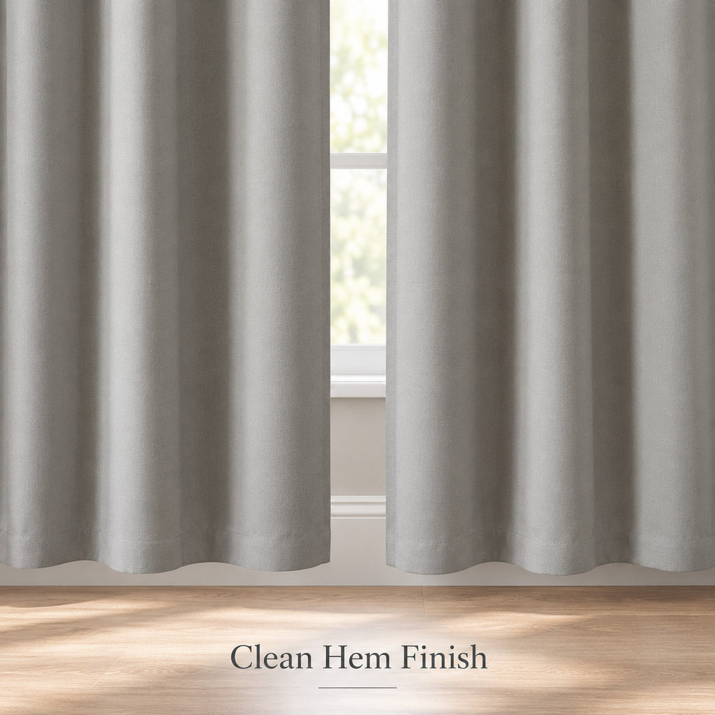 Light gray blackout curtain panels, front view