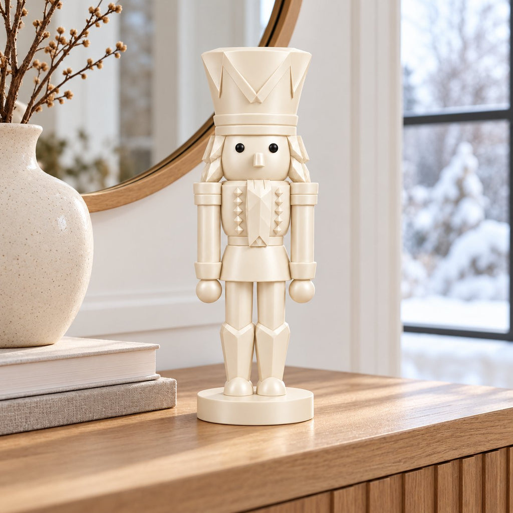 Ivory nutcracker figurine on an entryway console table