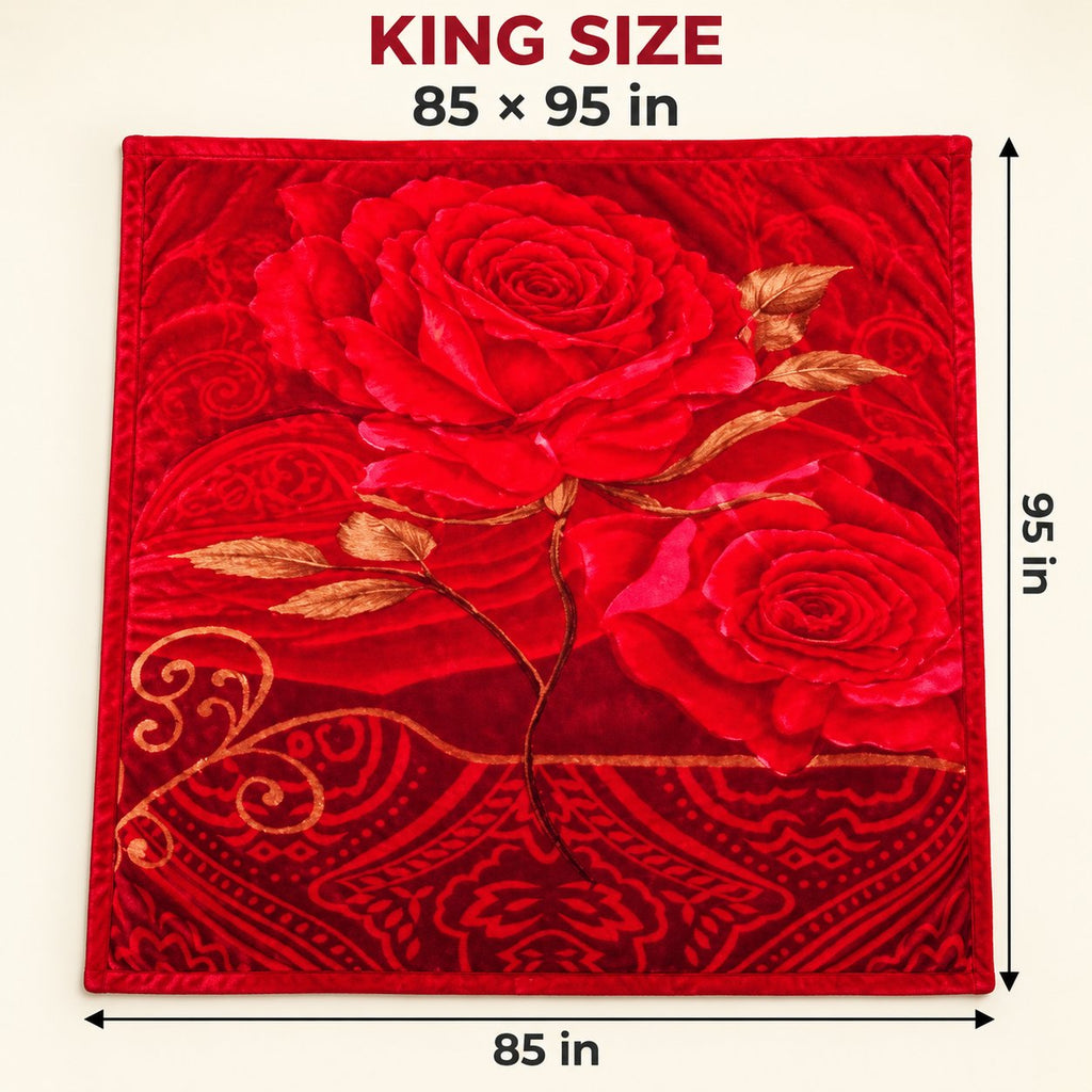 Red rose blanket draped on sofa by winter window