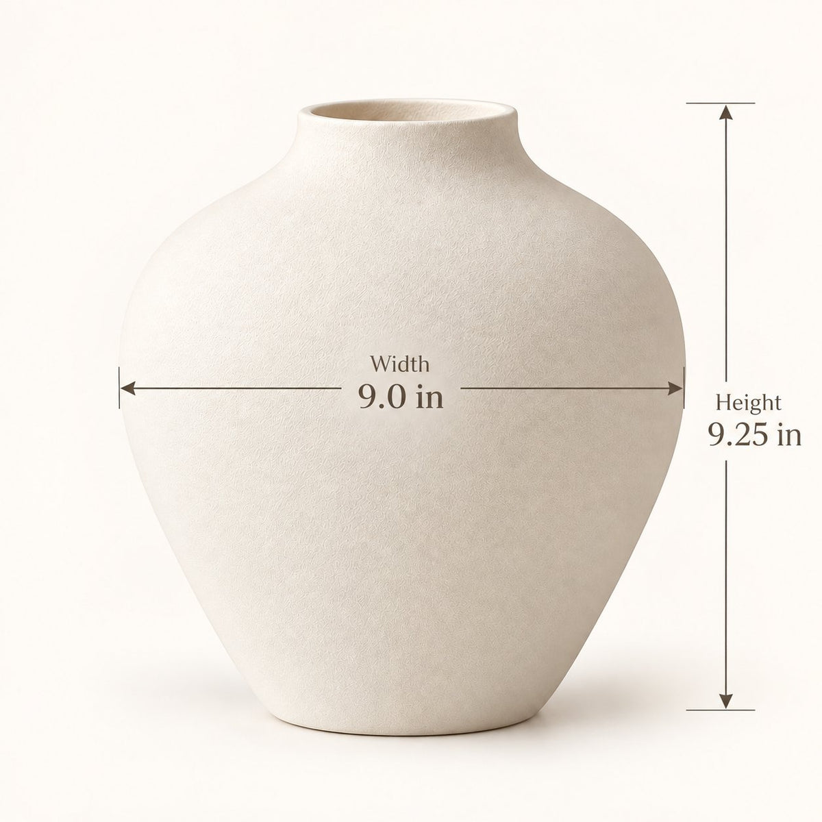 White vase dimensions: 9 inches wide, 9.25 inches tall