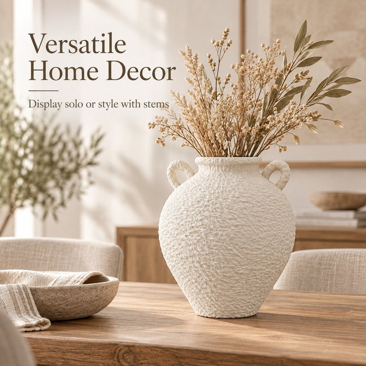 White textured vase with dried flowers on dining table